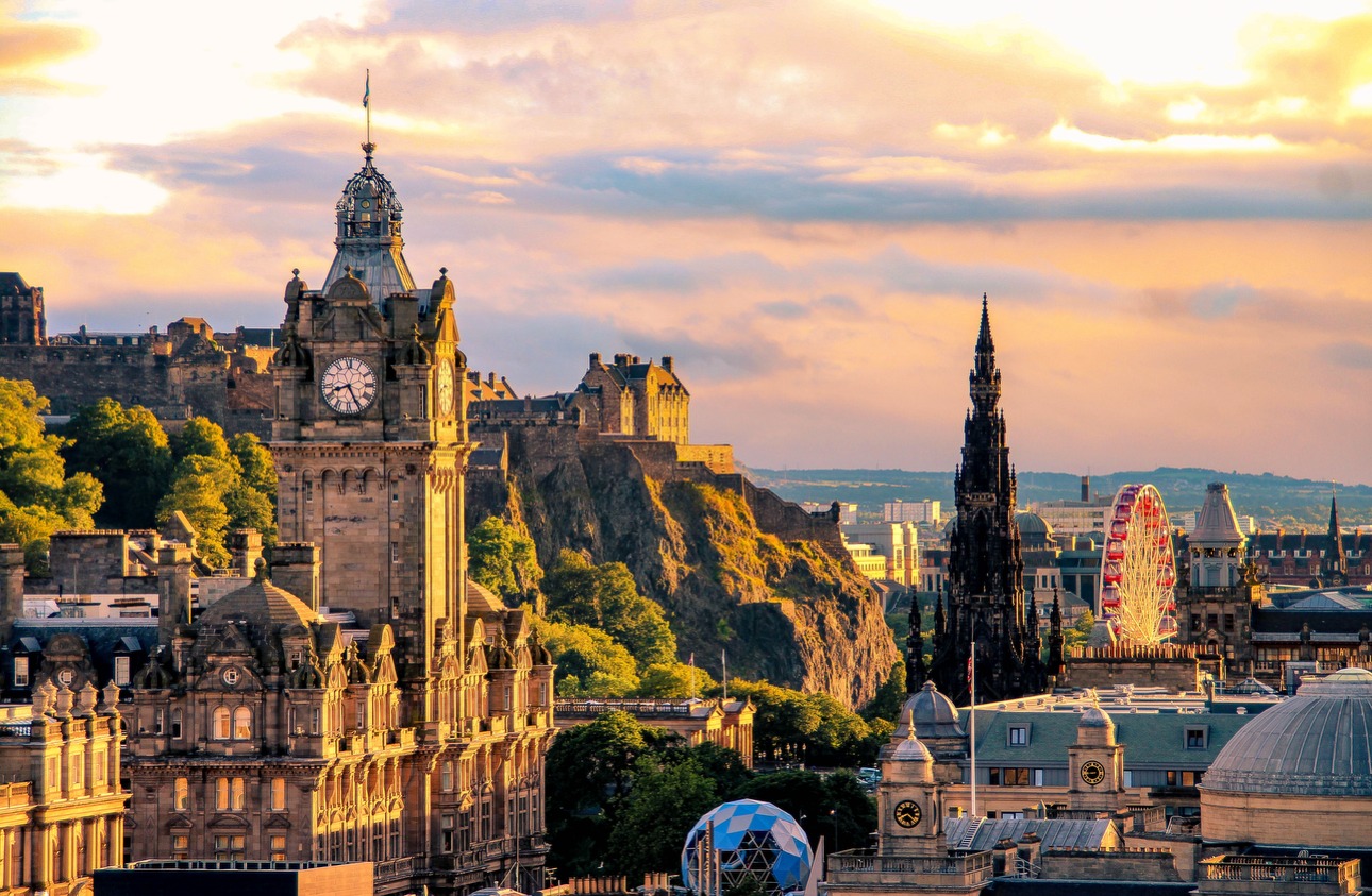 Edinburgh skyline at sunset with the castle and Scott Monument