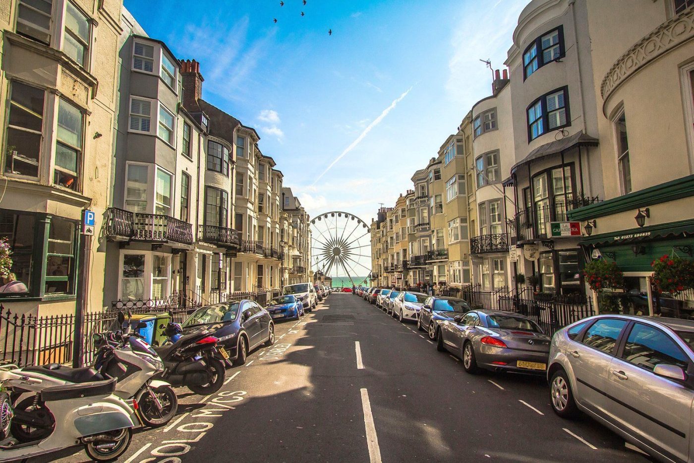 A Brighton street of Regency townhouses leading down to the seafront Ferris wheel